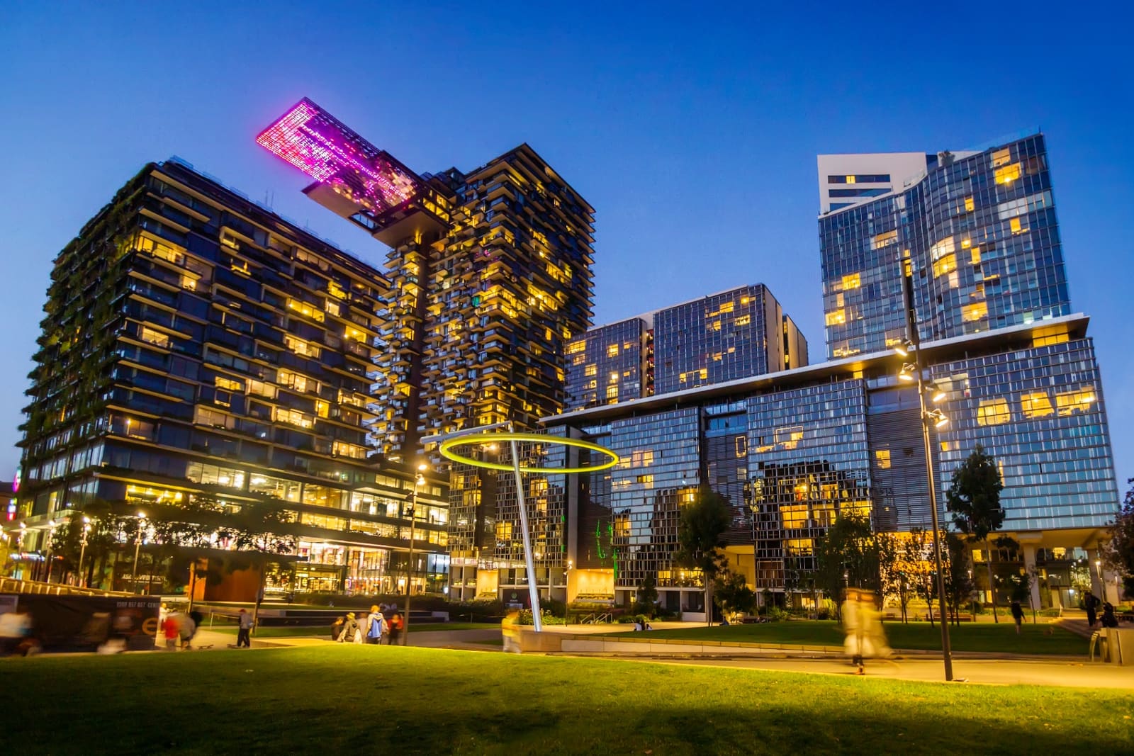 Mixed-use residential and commercial development at dusk — illustrative of SMSF property investment.